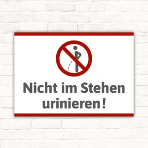 Schild Nicht im Stehen urinieren