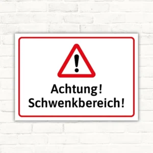 Warnschild mit rotem Warndreieck und dem Text Achtung! Schwenkbereich!