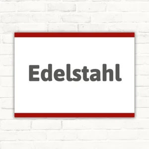 Schild mit dem Wort Edelstahl in dunkelgrauer Schrift auf weißem Hintergrund im Querformat.