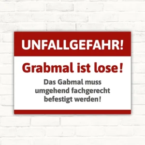Warnschild mit dem Text Unfallgefahr! Grabmal ist lose! Das Grabmal muss umgehend fachgerecht befestigt werden!