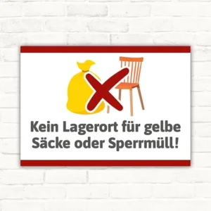 Schild mit der Aufschrift Kein Lagerort für gelbe Säcke oder Sperrmüll und Motiv aus gelbem Sack, Stuhl und rotem Verbotssymbol.