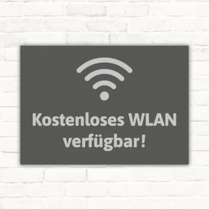 Graues Schild mit WLAN-Symbol und dem Text „Kostenloses WLAN verfügbar!“
