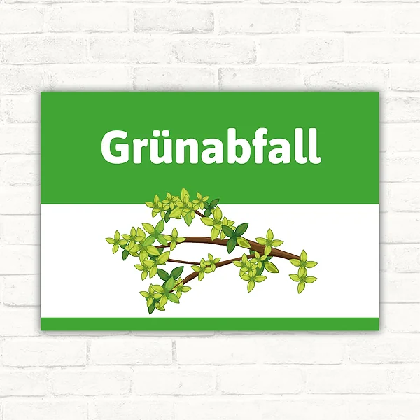 Schild mit der Aufschrift Grünabfall und einem Zweig mit grünen Blättern