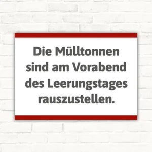 Hinweisschild mit dem Text: Die Mülltonnen sind am Vorabend des Leerungstages rauszustellen.