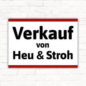 Verkauf von Heu und Stroh Schild mit schwarzem Text auf weißem Hintergrund und rotem Rand