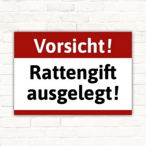 Warnschild mit dem Text „Vorsicht! Rattengift ausgelegt!“ in Rot, Weiß und Schwarz