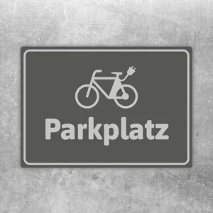Grauer Aufkleber mit E-Bike-Symbol und dem Wort Parkplatz für klare Stellplatzkennzeichnung.