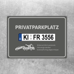 Grauer Aufkleber für Privatparkplatz mit Kennzeichen und Abschleppwagen-Motiv.