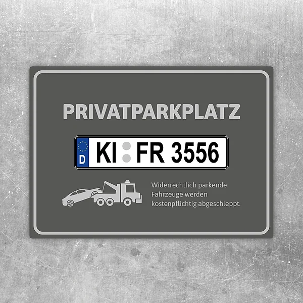 Grauer Aufkleber für Privatparkplatz mit Kennzeichen und Abschleppwagen-Motiv.