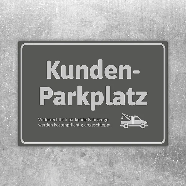 Grauer Aufkleber mit der Aufschrift Kunden-Parkplatz und Abschlepper-Symbol für reservierte Stellflächen.