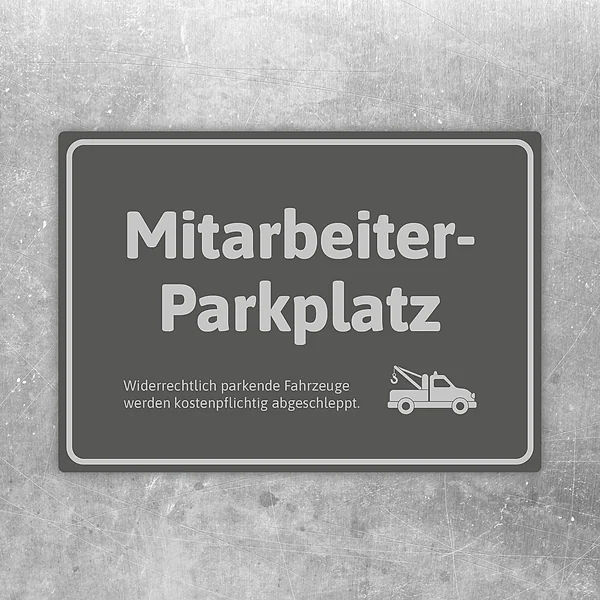 Grauer Aufkleber für Mitarbeiterparkplatz mit Abschlepper-Symbol und klarer Hinweisfunktion.