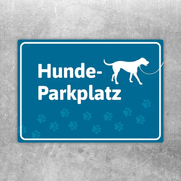 Blauer Aufkleber mit der Aufschrift Hunde-Parkplatz und Hundesilhouette für Stellflächen.