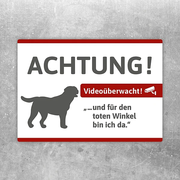 Aufkleber mit Labrador-Silhouette und Hinweis auf Videoüberwachung im Eingangsbereich.