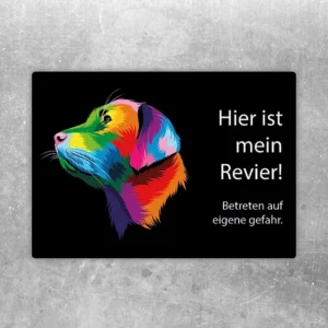 Aufkleber mit buntem Mischlingshund und dem Text: Hier ist mein Revier, Betreten auf eigene Gefahr.