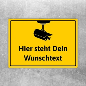 Aufkleber mit Kamerasymbol und Wunschtext für den Hinweis auf Videoüberwachung.
