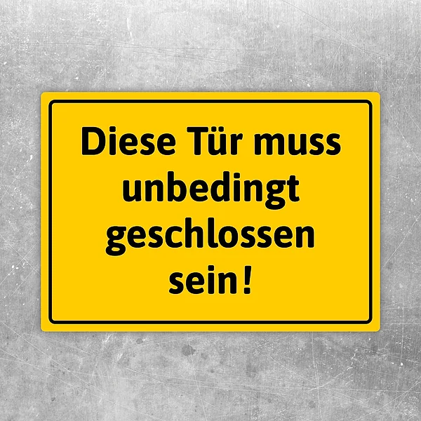 Aufkleber mit dem Hinweis: Diese Tür muss unbedingt geschlossen sein.