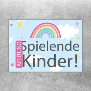 Bunter Aufkleber mit Regenbogen und dem Hinweis Achtung spielende Kinder.