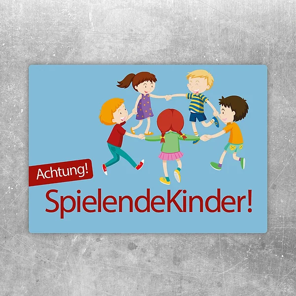 Aufkleber mit dem Hinweis Achtung spielende Kinder und fröhlichem Motiv auf blauem Hintergrund