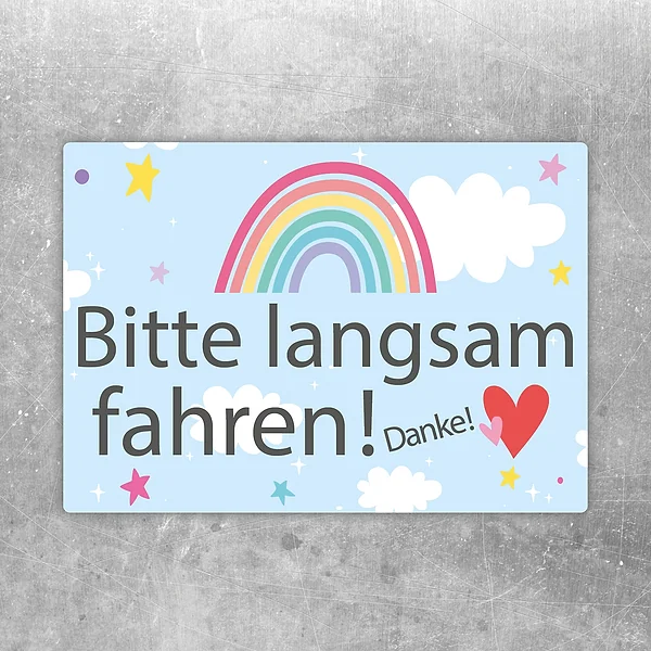 Aufkleber mit Regenbogen, Herz und dem Hinweis Bitte langsam fahren. Danke!