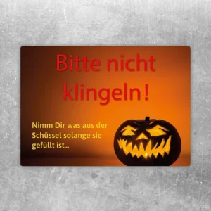 Halloween-Aufkleber mit Kürbis und dem Hinweis Bitte nicht klingeln, nimm Dir was Süsses für die Haustür.