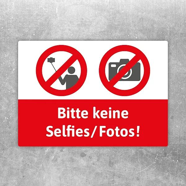 Aufkleber mit dem Hinweis Bitte keine Selfies und Fotos in roter Verbotssymbolik.