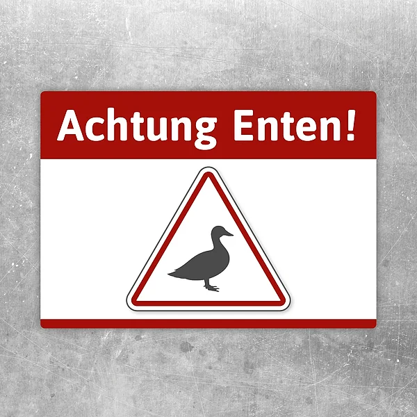 Aufkleber mit der Aufschrift Achtung Enten und einem Warnsymbol mit Ente.
