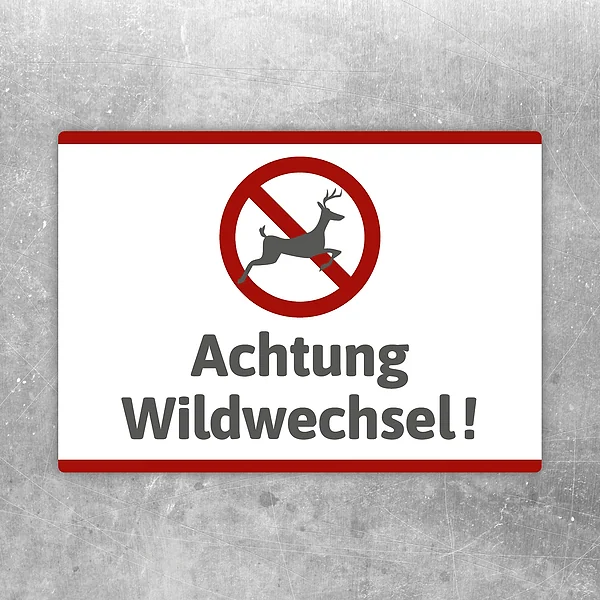 Aufkleber mit dem Hinweis Achtung Wildwechsel und Wildsymbol für klare Warnsignale.