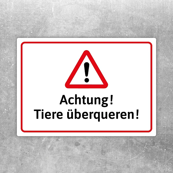 Warnaufkleber mit Warnsymbol und Text „Achtung! Tiere überqueren!“