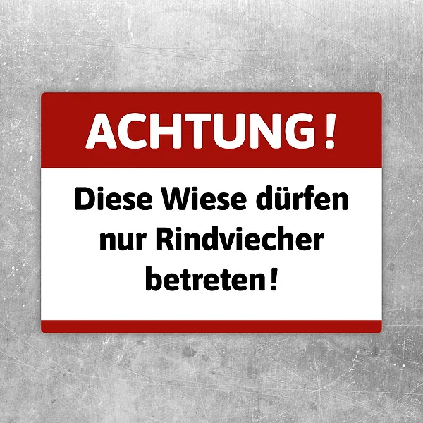 Aufkleber mit dem Spruch „Achtung! Diese Wiese dürfen nur Rindviecher betreten“ in Rot, Weiß und Schwarz.