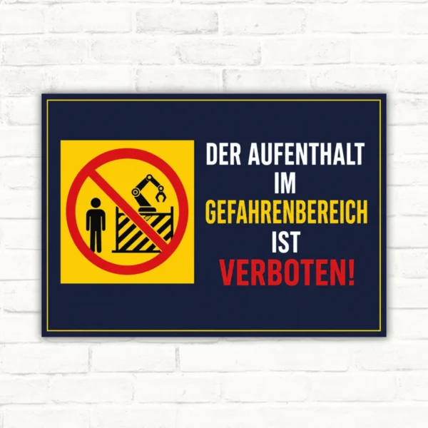 Aufenthalt im Gefahrenbereich ist verboten Schild mit Verbotszeichen, gelber Grafik und gut lesbarem Text auf dunklem Hintergrund.