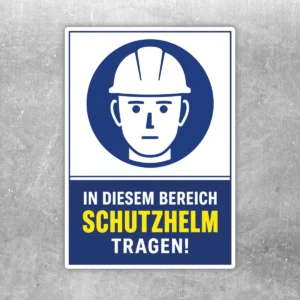 Schutzhelm tragen Aufkleber mit blauem Piktogramm und gelbem Hinweistext für Baustelle und Betrieb.