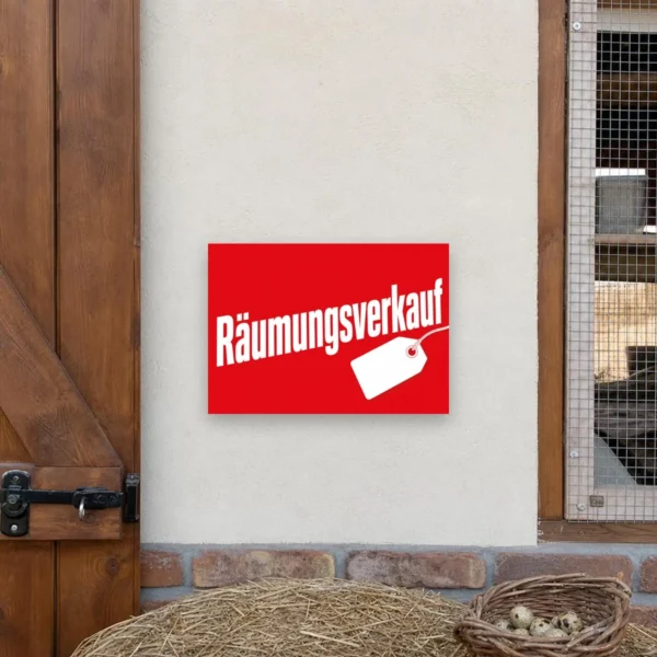 KI-generiertes Anwendungsbeispiel: Roter Räumungsverkauf Aufkleber mit weißem Schriftzug und Preisschild-Motiv auf glatter Fläche.