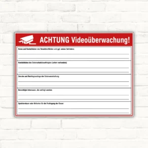 Bedrucktes Videoüberwachung Informationsschild mit roter Kopfzeile, Kamera-Symbol und ausfüllbaren DSGVO-Feldern.