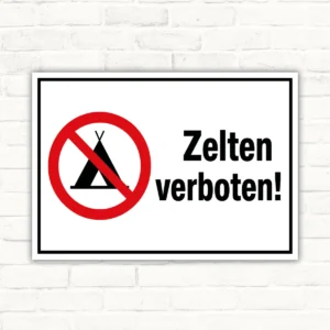 Schild mit rotem Verbotssymbol und Text „Zelten verboten!“ als klares Verbotsschild im Querformat.