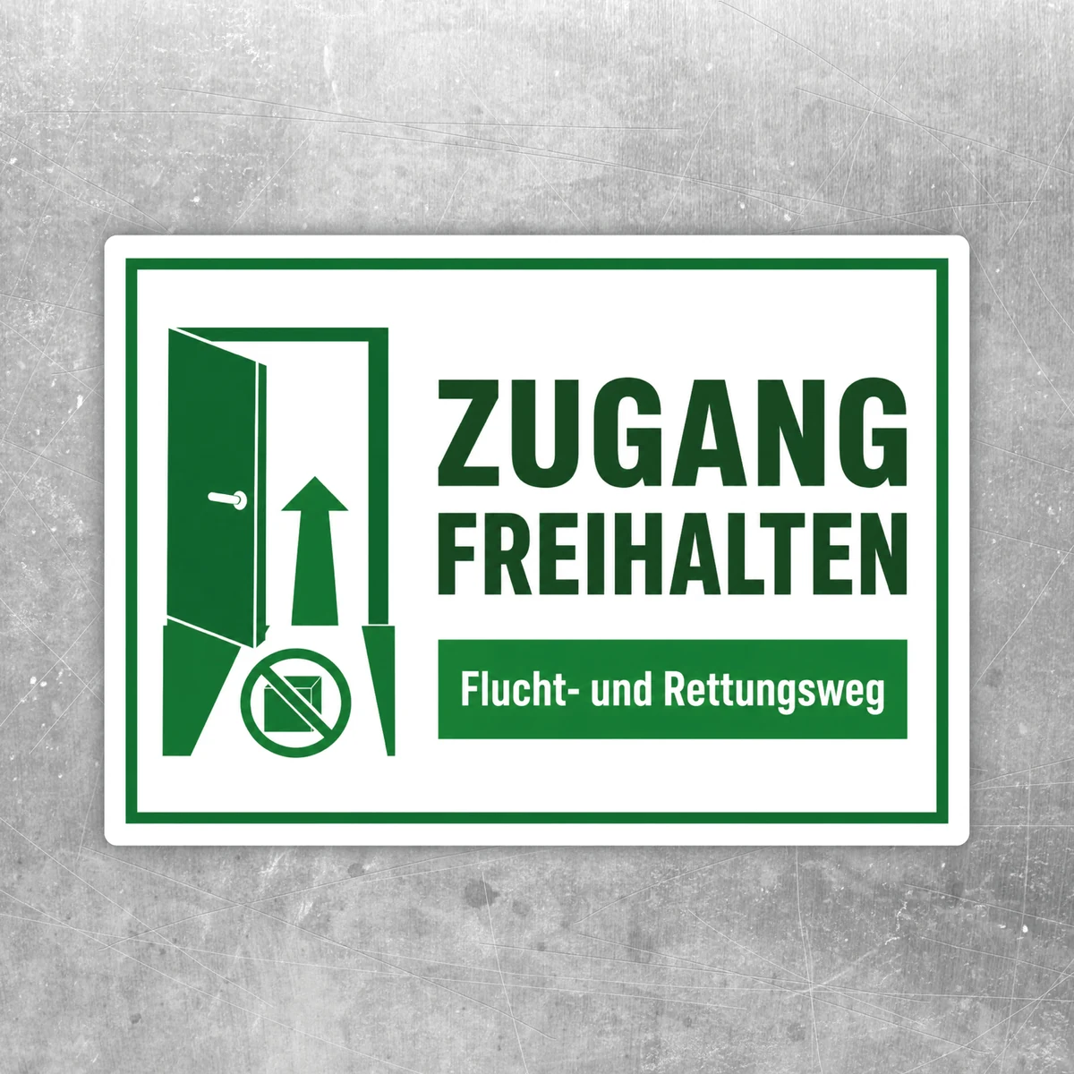 Grün-weißer Aufkleber mit der Aufschrift „Zugang freihalten“ für Flucht- und Rettungswege auf glatter Fläche.