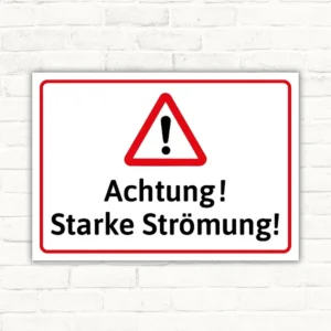 Warnschild mit dem Text Achtung! Starke Strömung! in Rot, Schwarz und Weiß