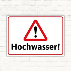 Warnschild mit der Aufschrift Hochwasser und rotem Warnsymbol