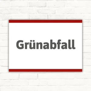 Schild mit dem Motivtext „Grünabfall“ in dunkelgrauer Schrift auf weißem Hintergrund mit rotem Rand.