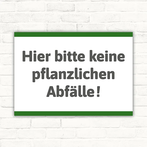 Querformatiges Schild mit dem Text „Hier bitte keine pflanzlichen Abfälle!“ in Dunkelgrau auf weißem Hintergrund mit grünem Rand.