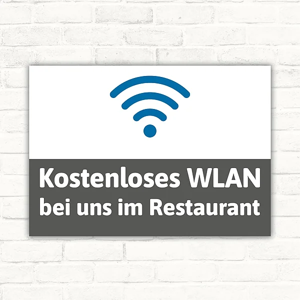 Hinweisschild mit WLAN-Symbol und dem Text „Kostenloses WLAN bei uns im Restaurant“ in Weiß, Blau und Dunkelgrau.