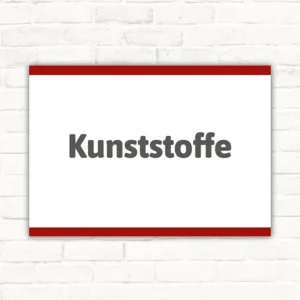 Hinweisschild mit dem Text Kunststoffe in dunkelgrauer Schrift auf weißem Hintergrund mit roten Linien oben und unten