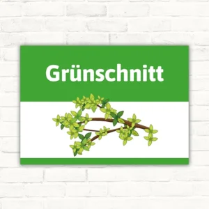 Schild mit dem Motiv Grünschnitt und Astzweig auf grün-weißem Hintergrund.