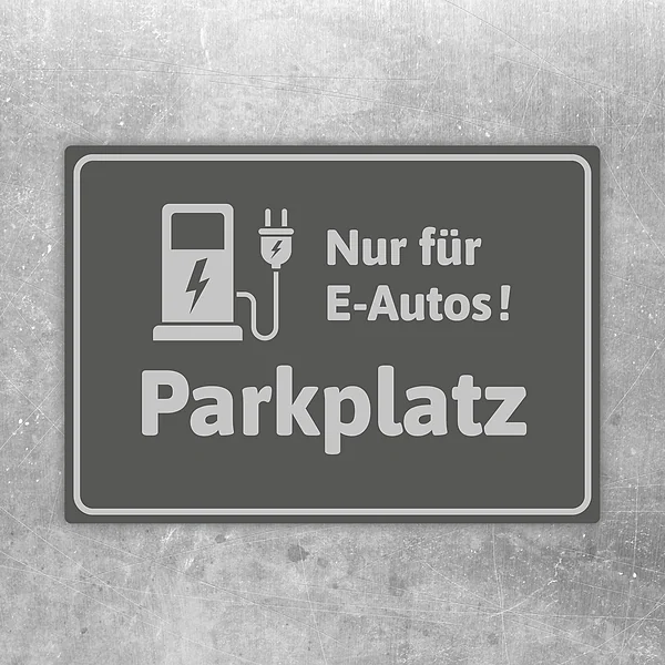 Grauer Aufkleber mit Ladesymbol und dem Hinweis „Nur für E-Autos! Parkplatz“.