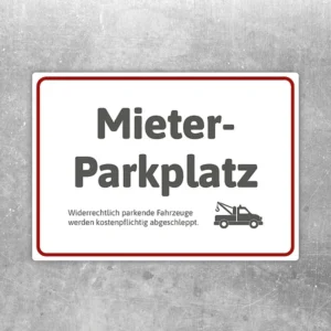 Aufkleber mit der Aufschrift Mieterparkplatz und Abschleppsymbol für reservierte Stellflächen.