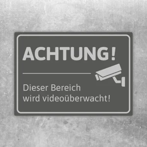 Aufkleber mit dem Hinweis Video-Bereich und Kamerasymbol für überwachte Zonen.