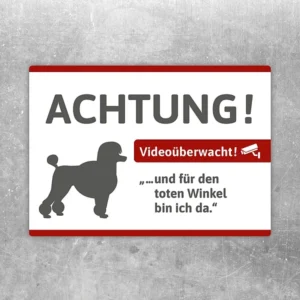 Aufkleber mit Pudel-Silhouette und Hinweis auf Videoüberwachung im toten Winkel.