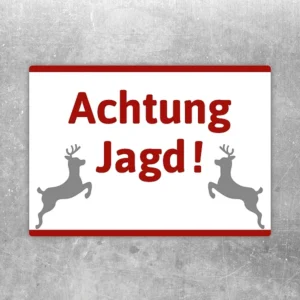 Aufkleber mit dem Hinweis Achtung Jagd und zwei stilisierten Hirschen als Warnmotiv.