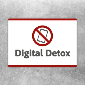 Aufkleber Digital Detox mit durchgestrichenem Smartphone als klarer Hinweis auf Handy-Pause.