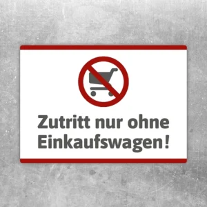 Aufkleber mit Verbotssymbol und Text „Zutritt nur ohne Einkaufswagen“ auf hellem Hintergrund.