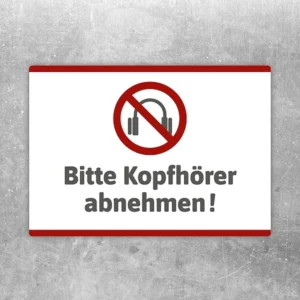 Aufkleber mit Kopfhörer-Verbotssymbol und dem Text Bitte Kopfhörer abnehmen.